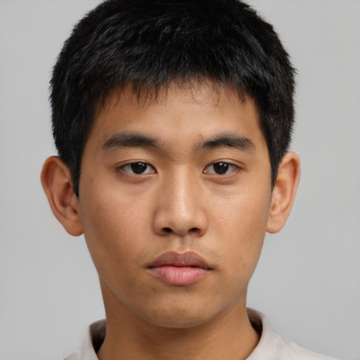 Neutral asian young-adult male with short  brown hair and brown eyes