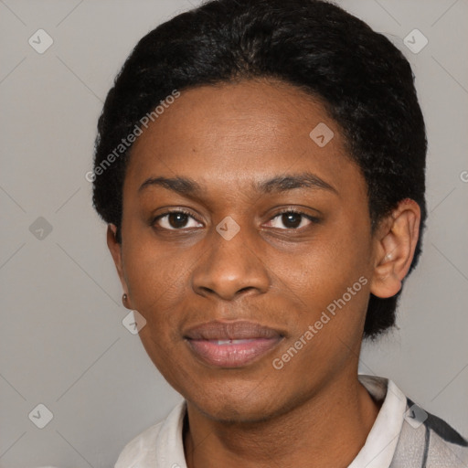 Joyful black young-adult female with short  black hair and brown eyes
