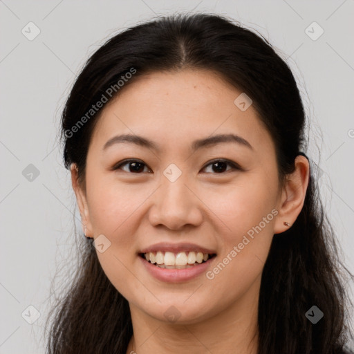 Joyful white young-adult female with long  brown hair and brown eyes