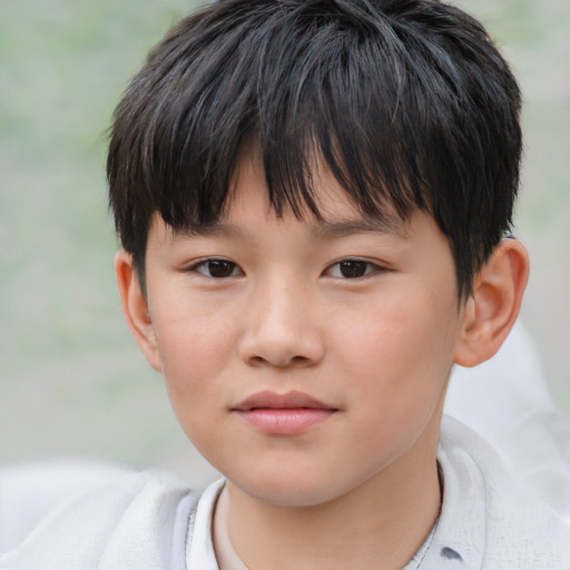 Neutral asian child male with short  brown hair and brown eyes