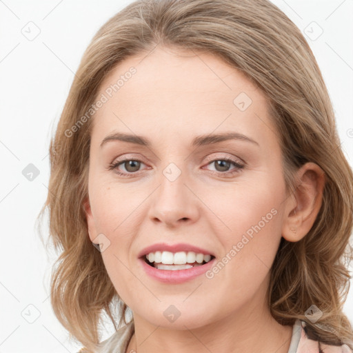 Joyful white young-adult female with medium  brown hair and blue eyes