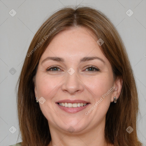 Joyful white adult female with medium  brown hair and brown eyes