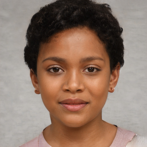 Neutral black child female with short  black hair and brown eyes