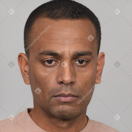 Neutral latino adult male with short  black hair and brown eyes
