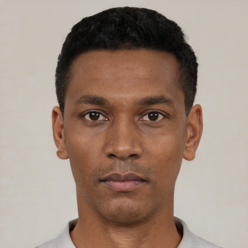 Neutral black young-adult male with short  black hair and brown eyes