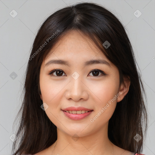 Joyful asian young-adult female with medium  brown hair and brown eyes