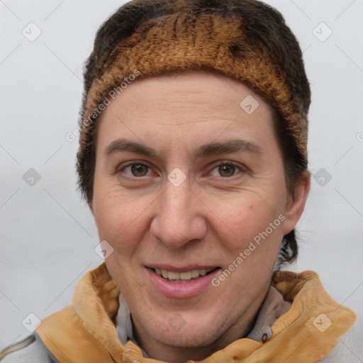 Joyful white adult female with short  brown hair and brown eyes