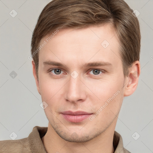 Neutral white young-adult male with short  brown hair and grey eyes