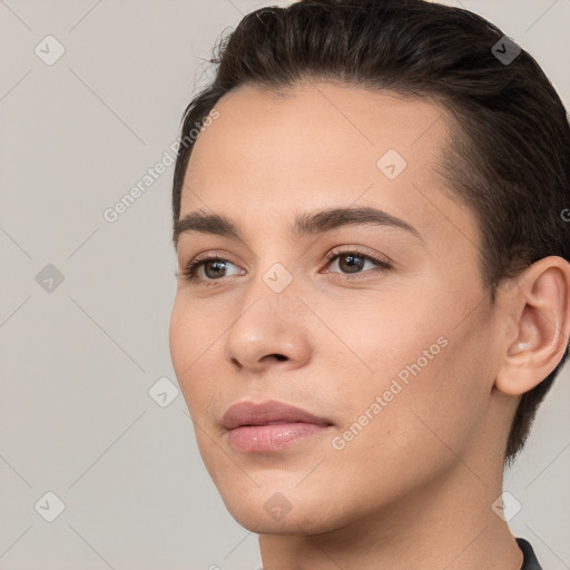 Joyful white young-adult female with short  brown hair and brown eyes