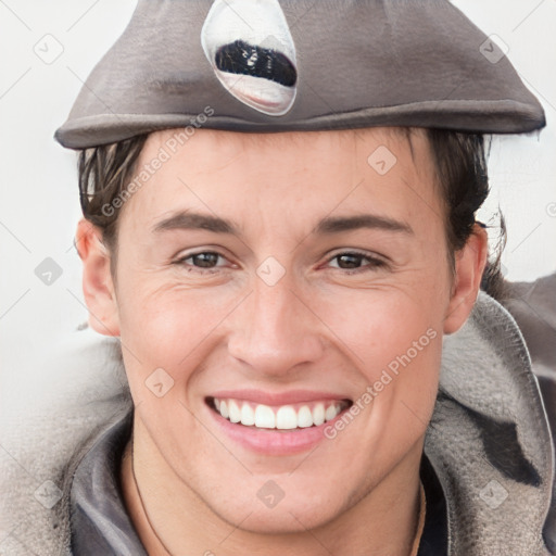 Joyful white young-adult female with short  brown hair and grey eyes