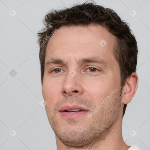 Neutral white adult male with short  brown hair and brown eyes