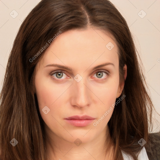 Neutral white young-adult female with long  brown hair and brown eyes