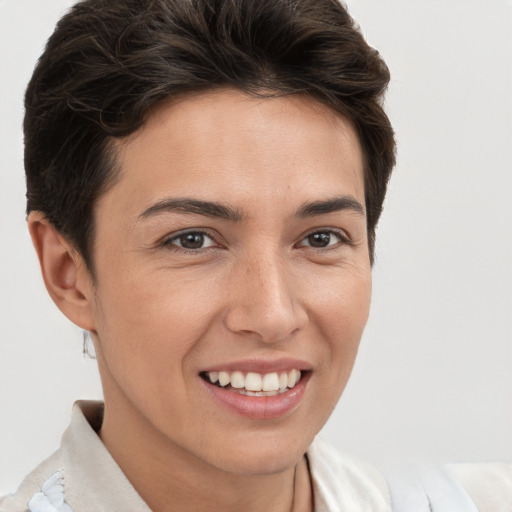 Joyful white young-adult female with short  brown hair and brown eyes