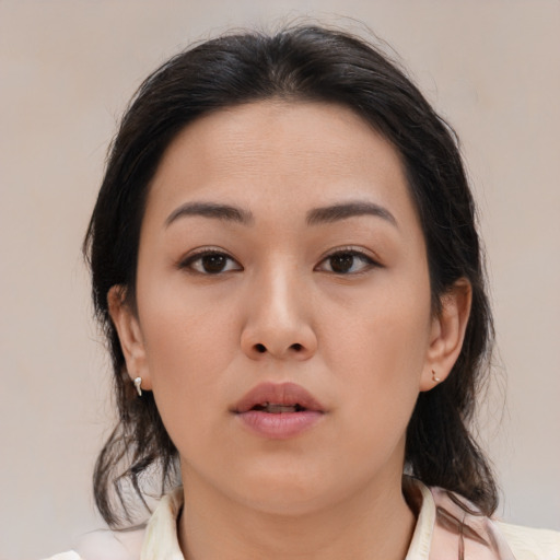 Neutral asian young-adult female with medium  brown hair and brown eyes