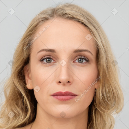 Joyful white young-adult female with long  brown hair and blue eyes