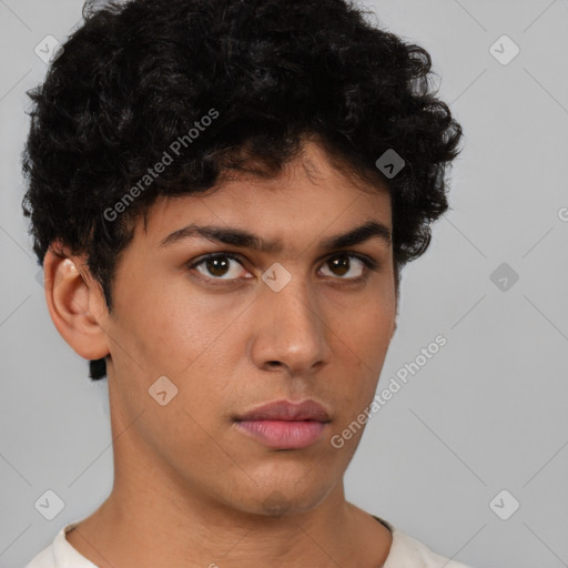 Neutral latino young-adult male with short  brown hair and brown eyes