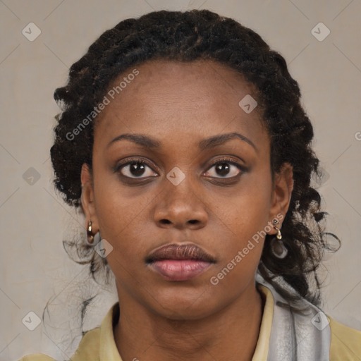 Neutral black young-adult female with medium  black hair and brown eyes