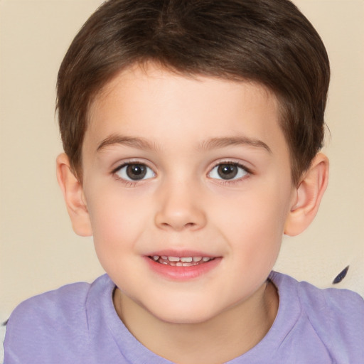 Joyful white child male with short  brown hair and brown eyes