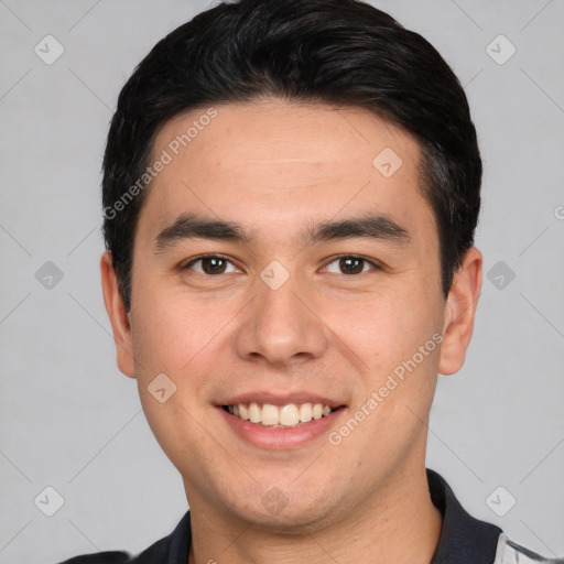 Joyful white young-adult male with short  black hair and brown eyes