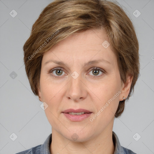 Joyful white adult female with medium  brown hair and grey eyes