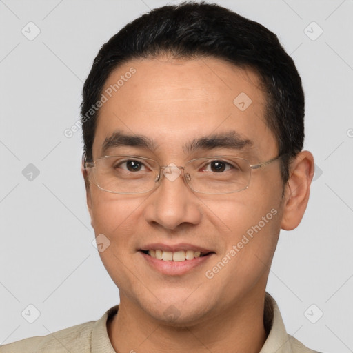 Joyful white adult male with short  brown hair and brown eyes