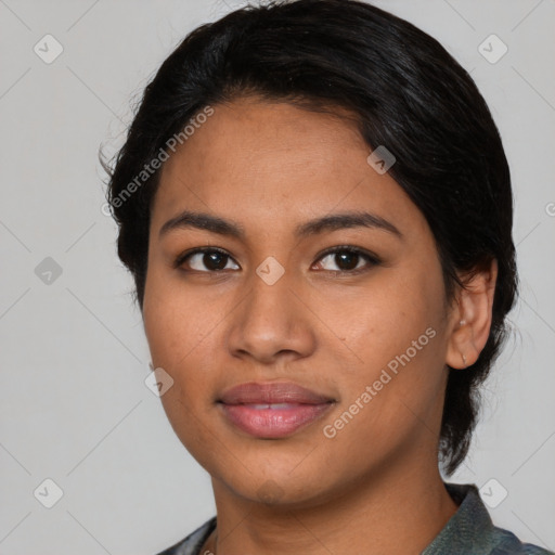 Joyful asian young-adult female with medium  black hair and brown eyes