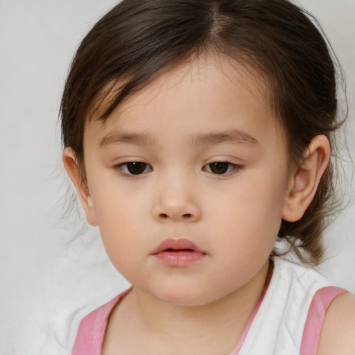 Neutral white child female with medium  brown hair and brown eyes