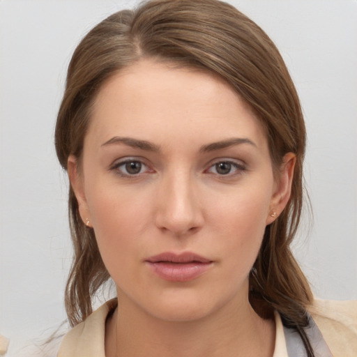 Neutral white young-adult female with medium  brown hair and brown eyes