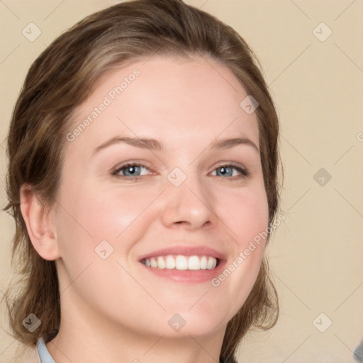 Joyful white young-adult female with medium  brown hair and blue eyes