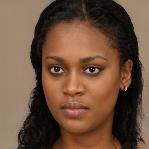 Neutral black young-adult female with long  black hair and brown eyes