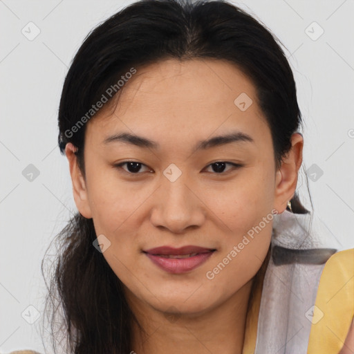 Joyful asian young-adult female with medium  brown hair and brown eyes