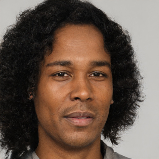 Neutral black young-adult male with short  brown hair and brown eyes