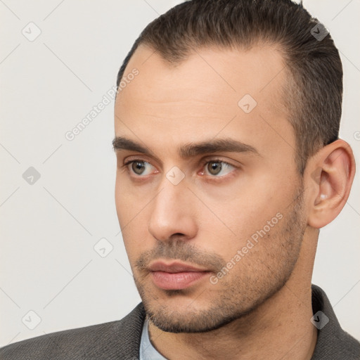 Neutral white young-adult male with short  brown hair and brown eyes