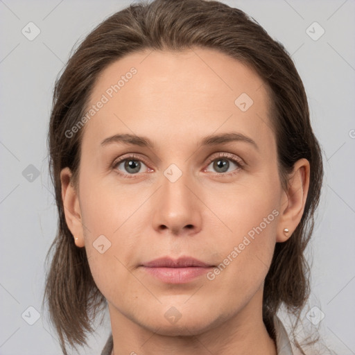 Neutral white young-adult female with medium  brown hair and brown eyes