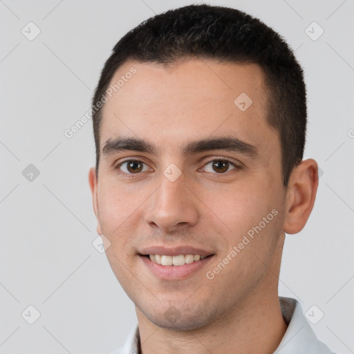 Joyful white young-adult male with short  brown hair and brown eyes