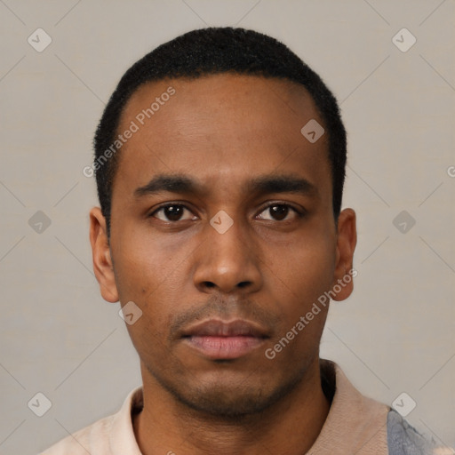 Neutral latino young-adult male with short  black hair and brown eyes