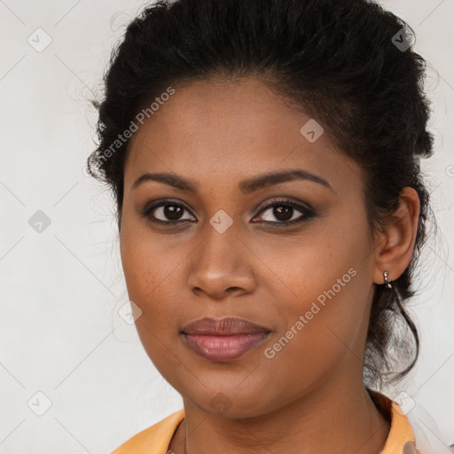 Joyful black young-adult female with long  brown hair and brown eyes