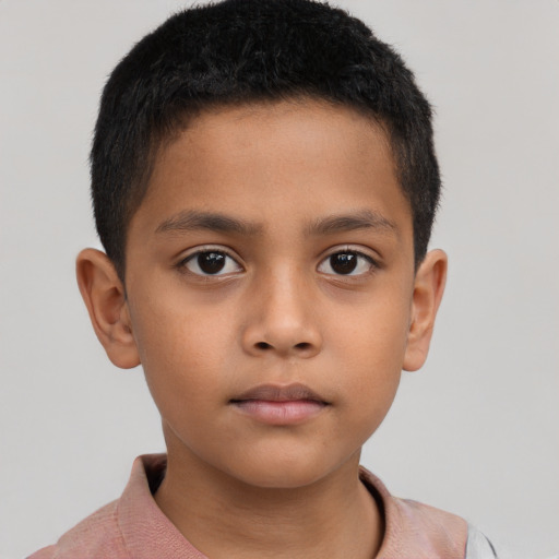 Neutral asian child male with short  brown hair and brown eyes