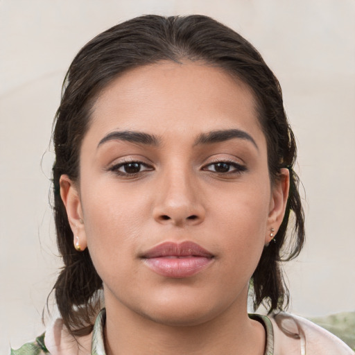 Neutral white young-adult female with medium  brown hair and brown eyes