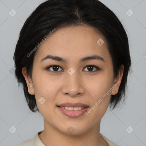 Joyful asian young-adult female with medium  brown hair and brown eyes