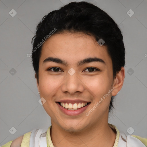 Joyful latino young-adult male with short  brown hair and brown eyes