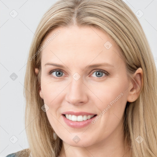 Joyful white young-adult female with long  brown hair and blue eyes