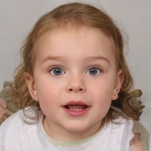 Joyful white child female with medium  brown hair and blue eyes