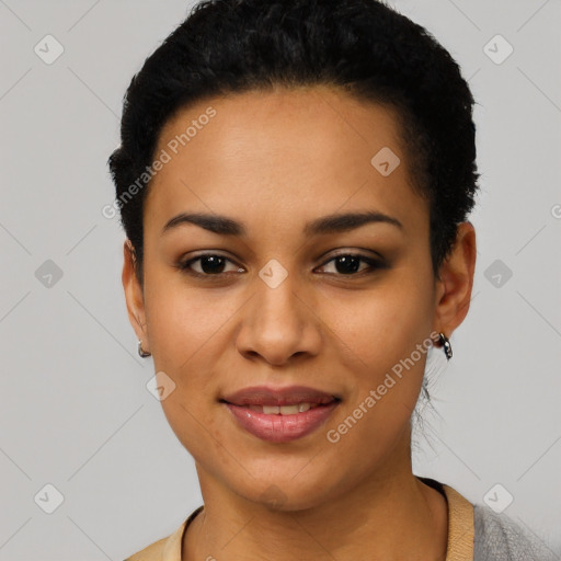 Joyful latino young-adult female with short  black hair and brown eyes