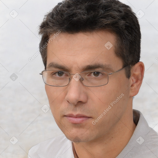 Neutral white adult male with short  brown hair and brown eyes