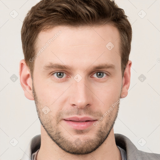 Neutral white young-adult male with short  brown hair and grey eyes