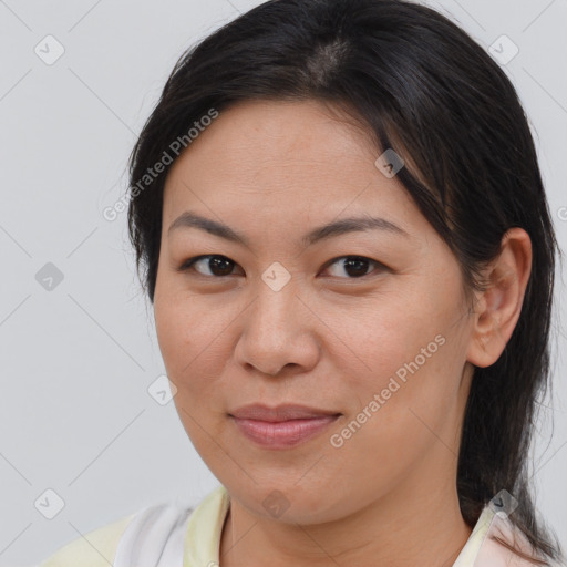 Joyful asian young-adult female with medium  brown hair and brown eyes