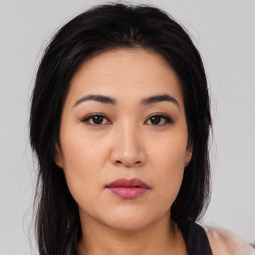 Neutral latino young-adult female with long  black hair and brown eyes