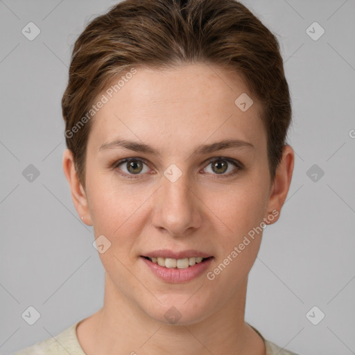 Joyful white young-adult female with short  brown hair and grey eyes