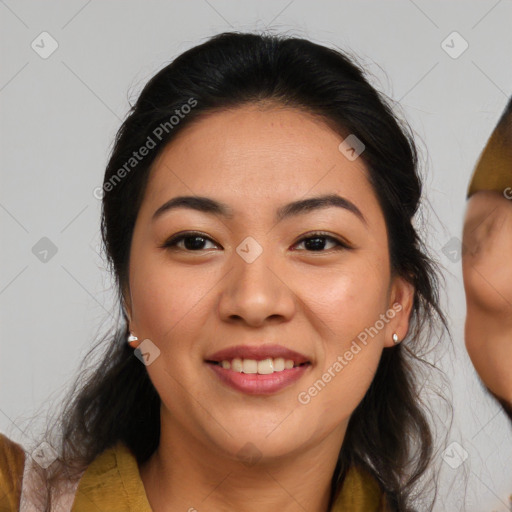 Joyful latino young-adult female with medium  brown hair and brown eyes